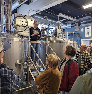 Tour group around a brewery