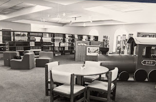 Couches, chairs, and tables in the library