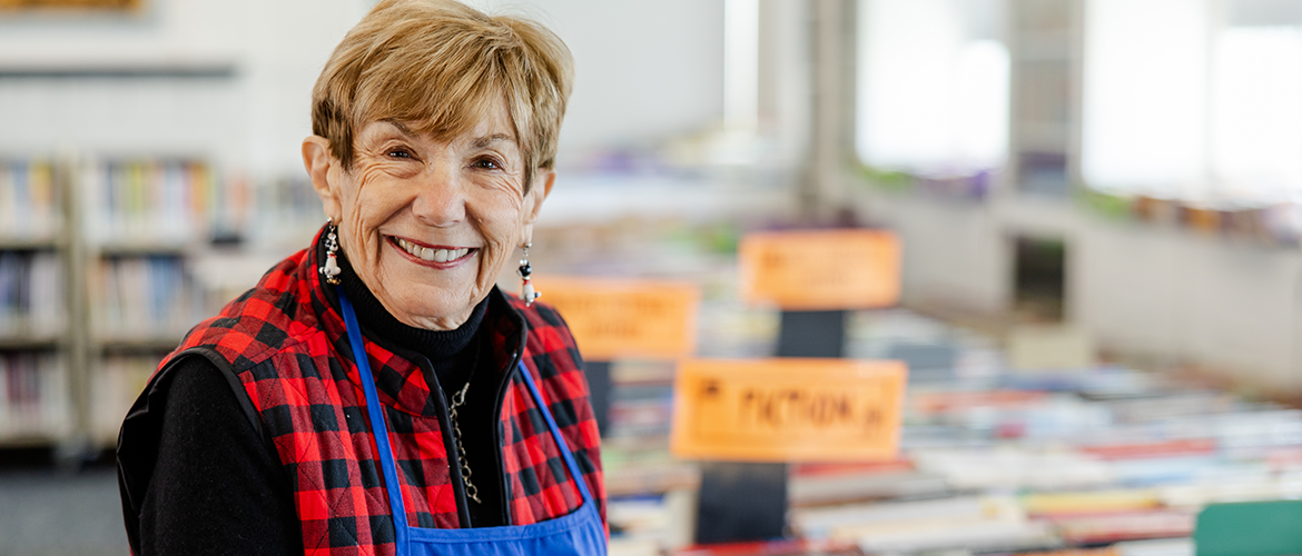 Friend member working the Friend's book sale