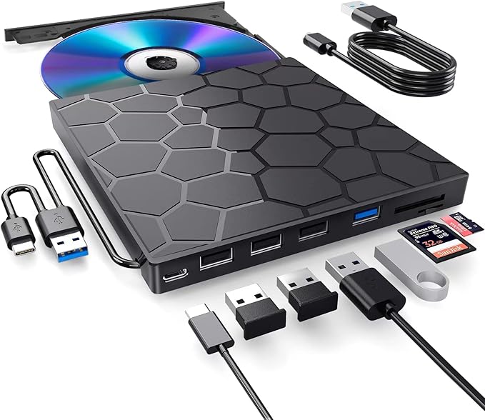 Image of external CD_RW drive and a variety of cords and storage media