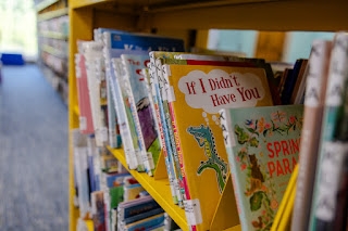 Book shelf filled with various children's books