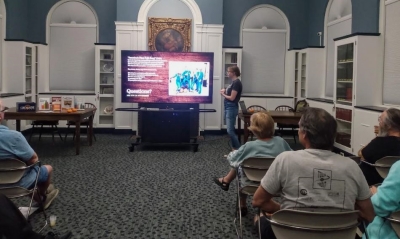 Michelle lecturing our Ale Together Now program in the Community Room. 