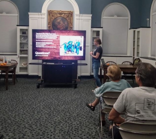 Michelle lecturing our Ale Together Now program in the Community Room. 