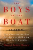 Boat with 8 rowers on the water below title, subtitle and author below image