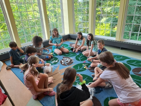 Tweens in the Youth Program Room playing Candyball. 