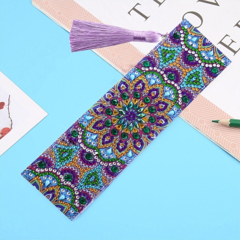 A bookmark decorated with tiny diamonds and jewels.