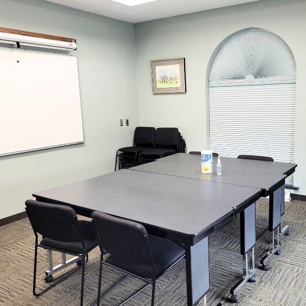 Room setup with chairs and tables